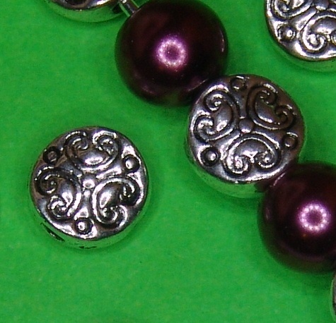 10 Metallperlen Buttonform mit Ornament